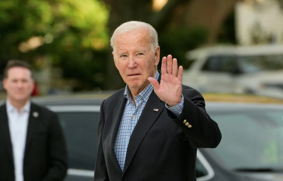 President Joe Biden waves as he departs St Edmond Catholic Church in Rehoboth Beach, Del., on Oct., 21, 2023. (Kent Nishimura/AFP via Getty Images)