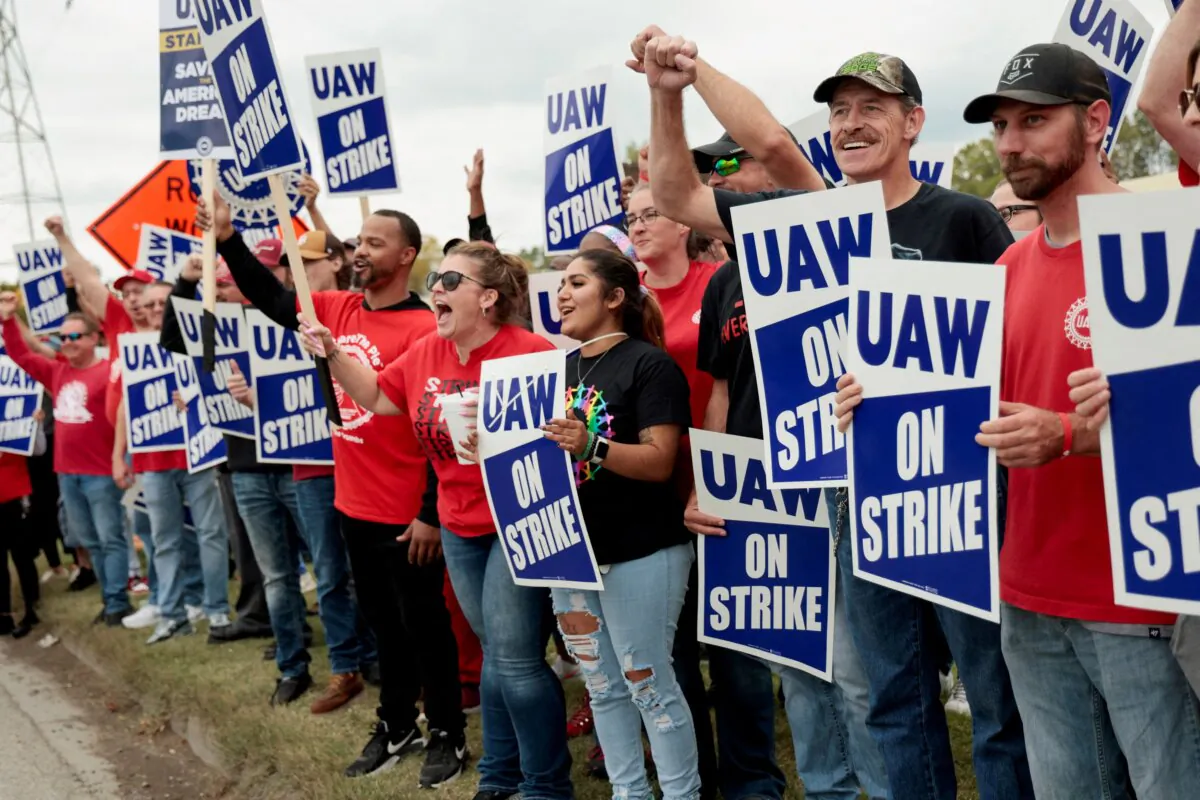 Striking United Auto Workers (UAW) members from the General Motors Lansing Delta Plant picket in Delta Township, Mich., on Sept. 29, 2023. (Rebecca Cook/Reuters)