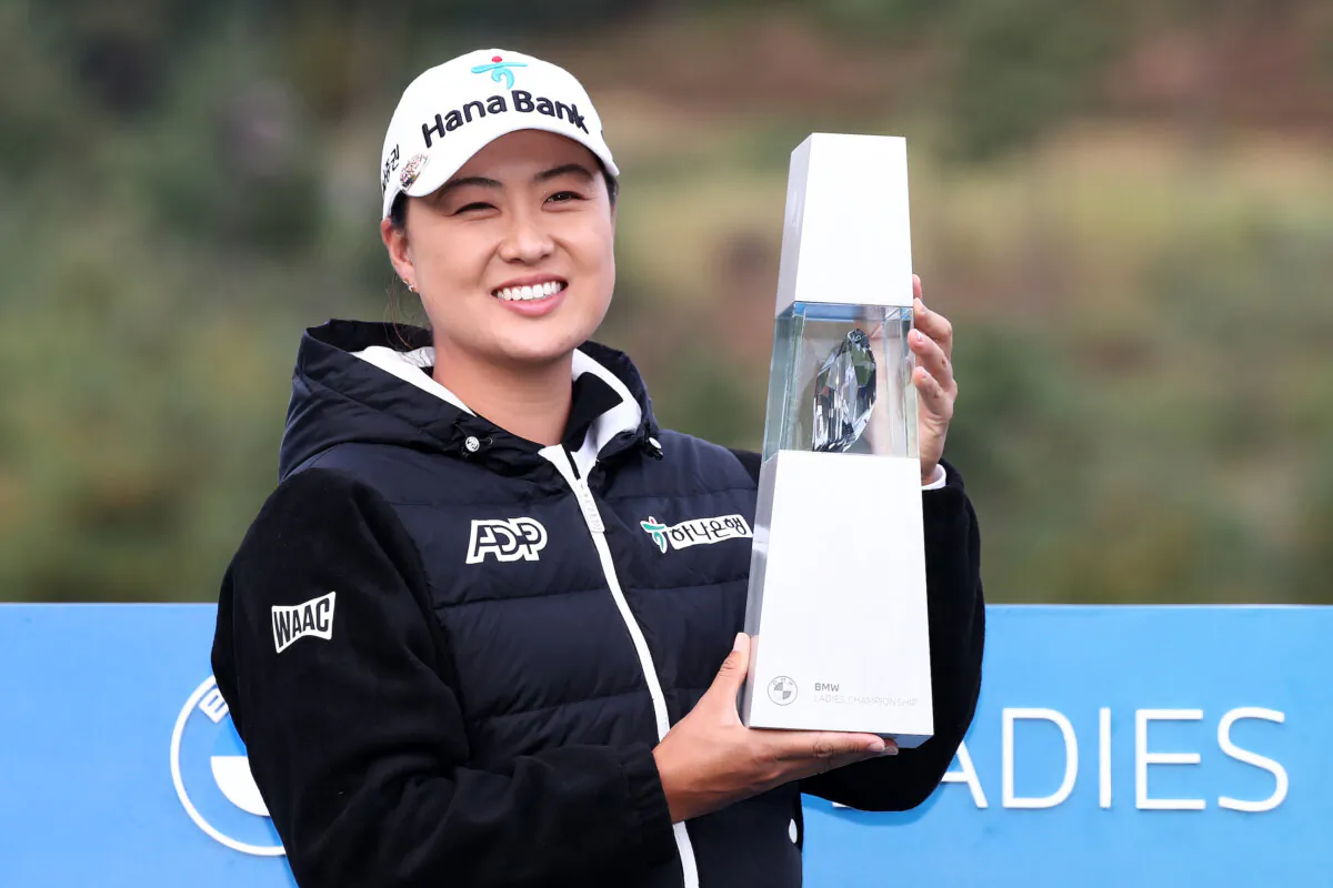 Minjee Lee of Australia celebrates with the trophy after winning the BMW Ladies Championship on the Seowon Hills course at Seowon Valley Country Club on October 22, 2023 in Gyeonggi-do, South Korea. (Photo by Chung Sung-Jun/Getty Images)