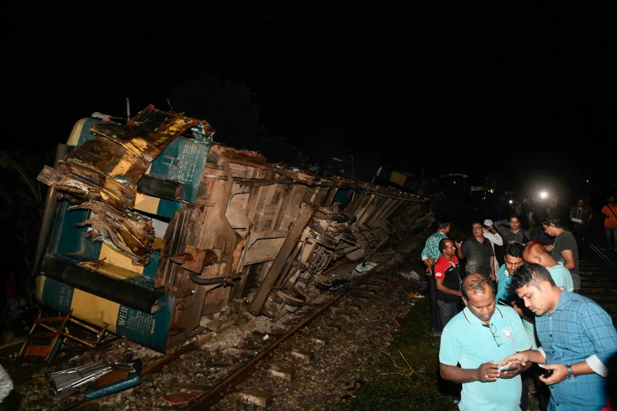 Derailed compartments of train after two trains collided in Bhairab, about 80 kilometers northeast of the capital Dhaka, Bangladesh on Oct. 23, 2023. (Piyas Biswas/Reuters)