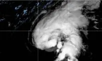 Heavy Rains Drench Northeast Caribbean as Hurricane Tammy Spins Into Open Waters