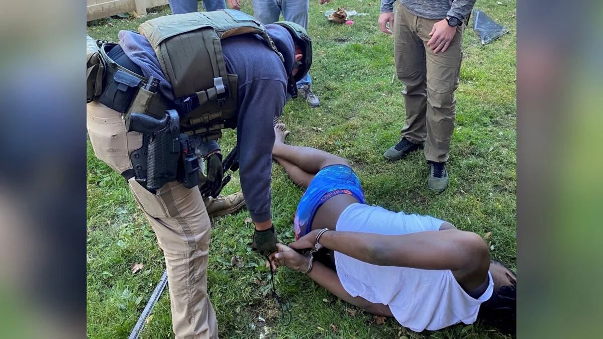Marshals take Dayron Burney-Thorn into custody in Philadelphia's Germantown neighborhood on Oct. 23, 2023. (United States Marshals Service via AP)