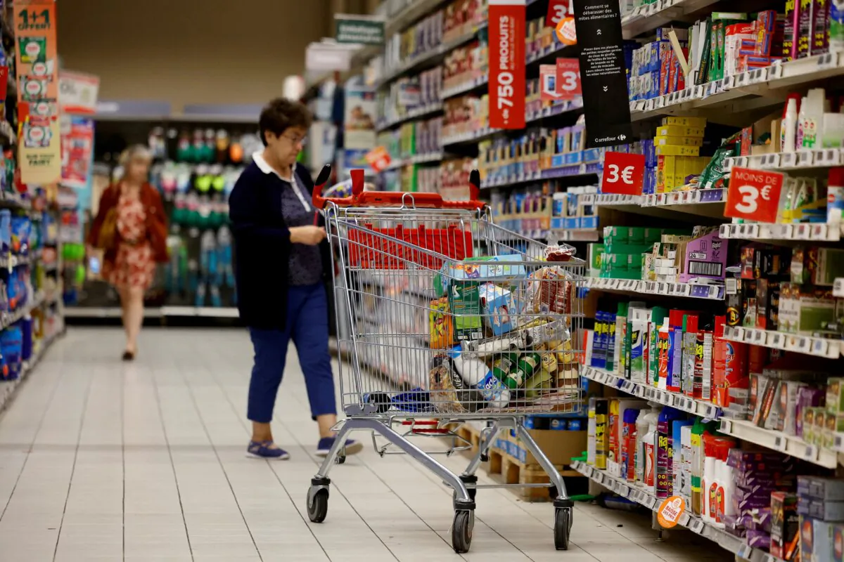 A shopping trolley as customers shop at a Carrefour supermarket in Montesson near Paris on Sept. 13, 2023. (Sarah Meyssonnier/Reuters)