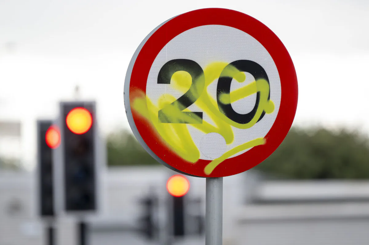 A vandalised 20 mph sign on Sloper Road in Cardiff, Wales, on Sept. 23, 2023. A default 20 mph speed limit has been introduced on restricted roads across Wales. (Matthew Horwood/Getty Images)