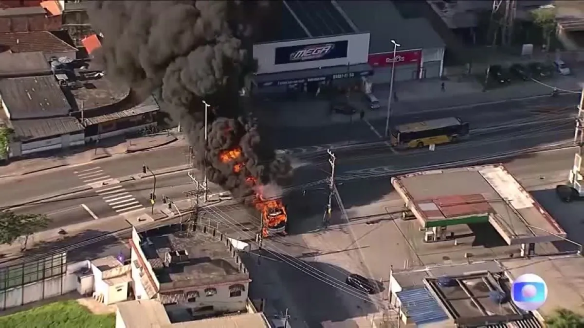 Buses in fire in the middle of roads, in Rio de Janeiro, Brazil, on Oct. 23, 2023, in this screen grab obtained from a video. (TV GLOBO/via Reuters)