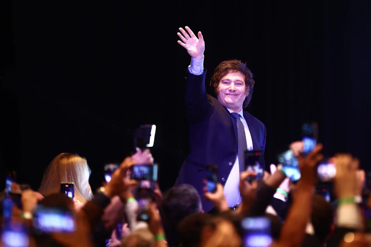 BUENOS AIRES, ARGENTINA - OCTOBER 22: Presidential candidate for La Libertad Avanza Javier Milei waves supporters after the general elections on October 22, 2023 in Buenos Aires, Argentina. According to official results, presidential candidate for Union Por La Patria Sergio Massa has 36,50% of the votes and presidential candidate for La Libertad Avanza Javier Milei 30,09%, with 95,54% of the voting counted. Massa and Milei will compete in the presidential runoff on November 19, 2023. The presidential election to succeed Alberto Fernandez comes as Argentinians have been hard hit by an annual 124% inflation and over 40% of the population is considered to be living in poverty. (Photo by Tomas Cuesta/Getty Images)