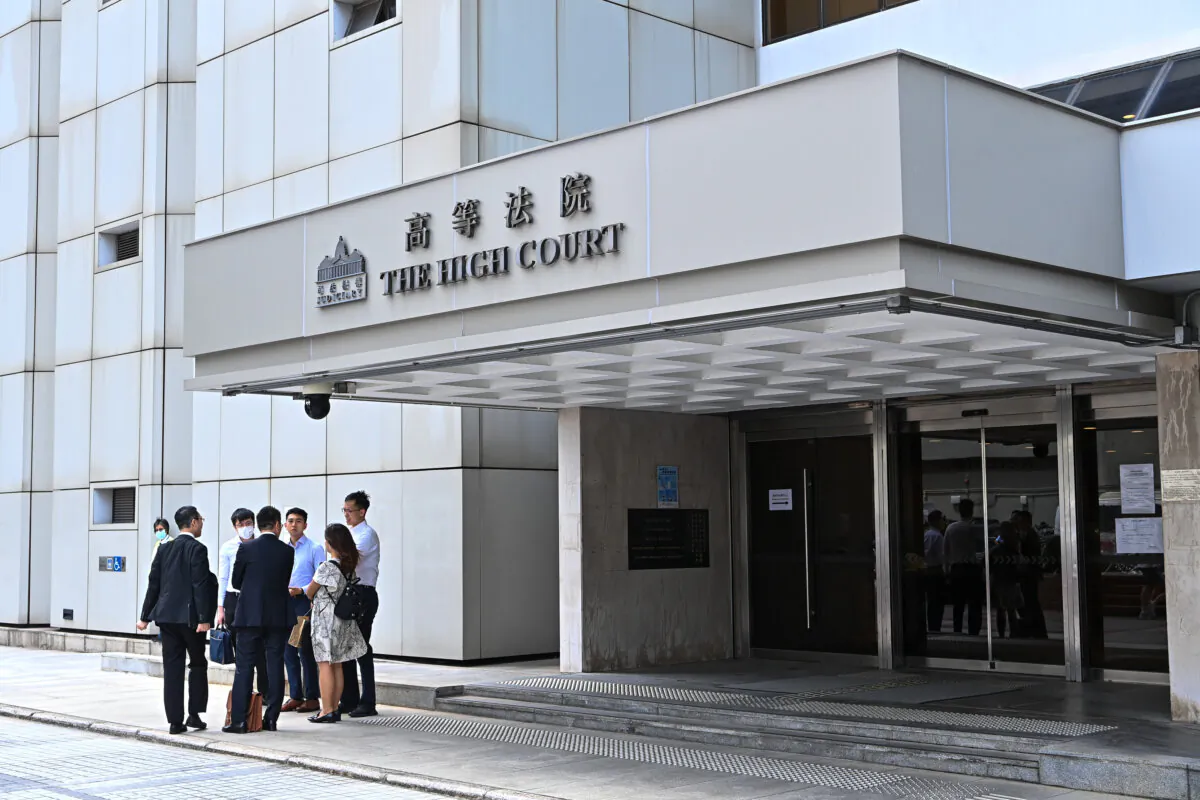 A scene outside the High Court on the day the application by the Department of Justice to ban "Glory to Hong Kong” was heard, in Hong Kong, on July 21, 2023. (Sung Pi-Lung/The Epoch Times)