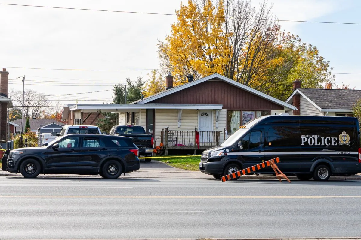 A police forensic unit attends a crime scene on Second Line, in Sault Ste. Marie, Ont., on Oct. 24, 2023. (The Canadian Press/Bob Davies)