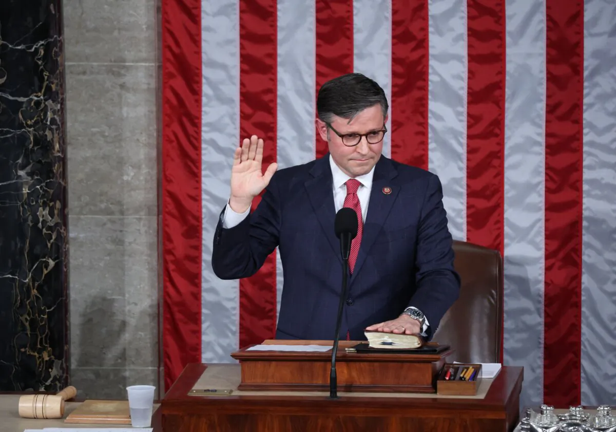 Newly elected House Speaker Mike Johnson (R-La.) is sworn in at the U.S. Capitol in Washington on Oct. 25, 2023. (Tom Brenner/AFP via Getty Images)