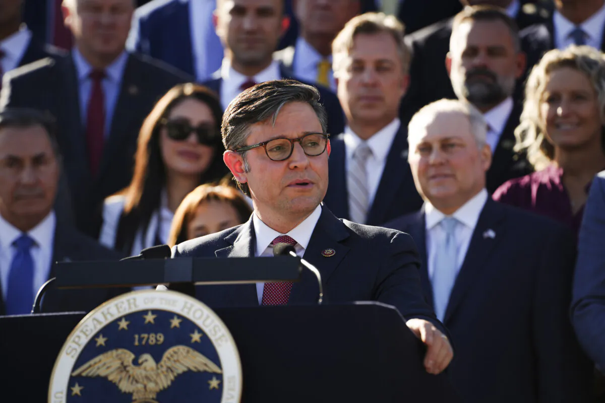 House Speaker Rep. Mike Johnson (R-La.) (C) speaks during a press conference on the U.S. Capitol steps in Washington on Oct. 25, 2023. (Madalina Vasiliu/The Epoch Times)