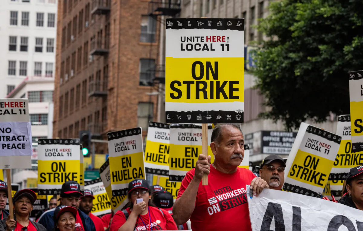 Hotel workers march in the streets of downtown Los Angeles on Oct. 25, 2023. (John Fredricks/The Epoch Times)