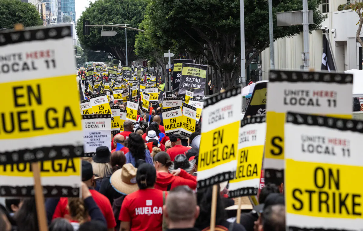 Hotel workers march in the streets of downtown Los Angeles on Oct. 25, 2023. (John Fredricks/The Epoch Times)