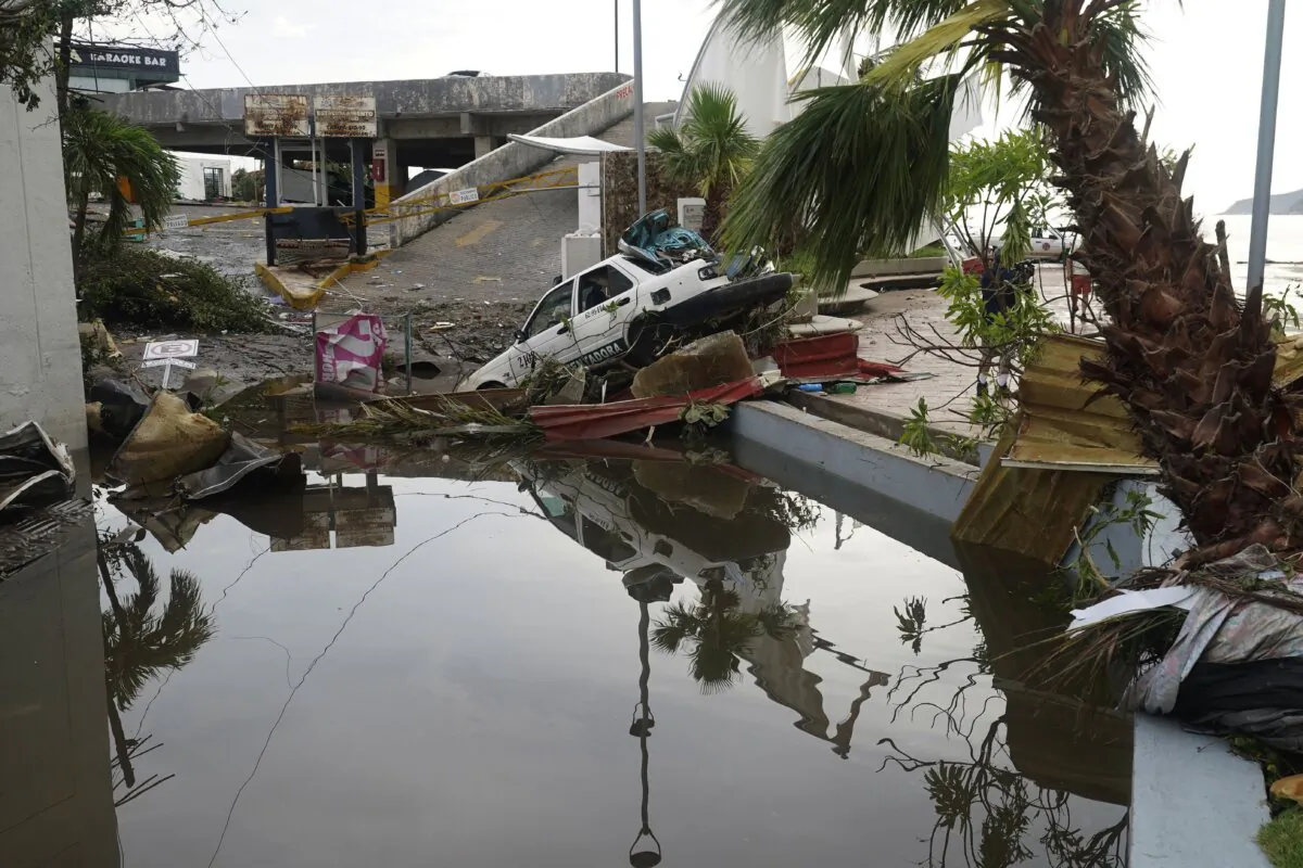 A street is strewn with debris after Hurricane Otis ripped through Acapulco, Mexico, on Oct. 25, 2023. (Marco Ugarte/AP Photo)