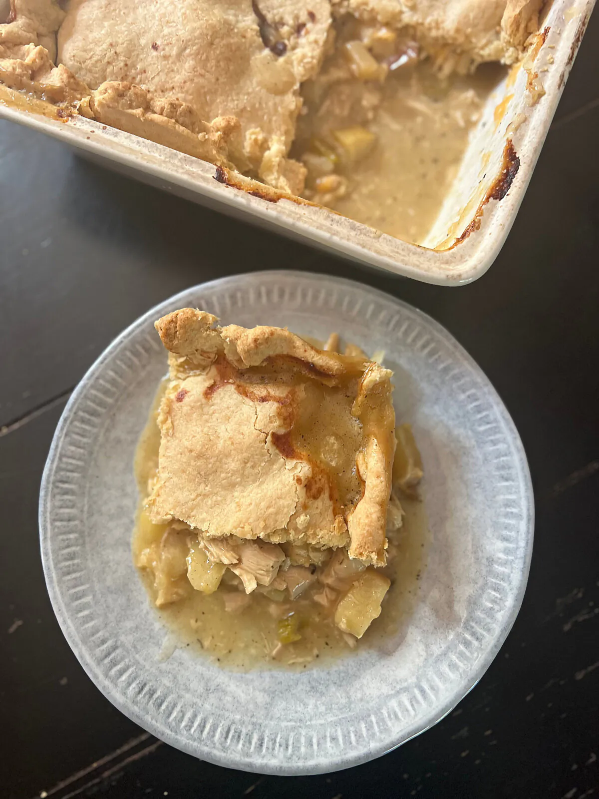 A buttery pot pie made with leftover chicken, apple and shredded cheddar is full of fall flavors. (Gretchen McKay/Pittsburgh Post-Gazette/TNS)