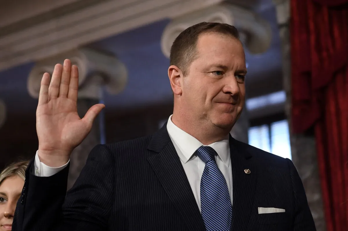 Sen. Eric Schmitt (R-Mo.) is ceremonially sworn in by Vice President Kamala Harris for the 118th Congress in the Old Senate Chamber at the U.S. Capitol, on Jan. 3, 2023. (Olivier Douliery/AFP via Getty Images)