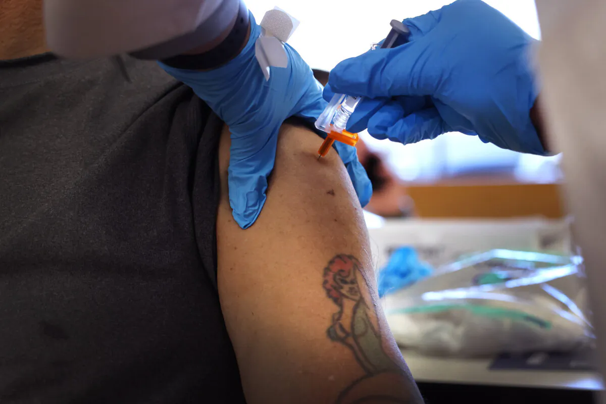 A person receives an influenza vaccine in Chicago, Ill., in a file photograph. (Scott Olson/Getty Images)