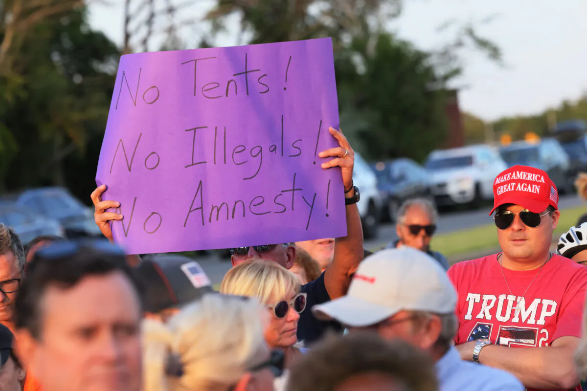 People protesting the placement of a tent shelter for 2,000 illegal immigrants in the Marine Park neighborhood of Brooklyn, New York, on Aug. 22, 2023 (Michael M. Santiago/Getty Images)