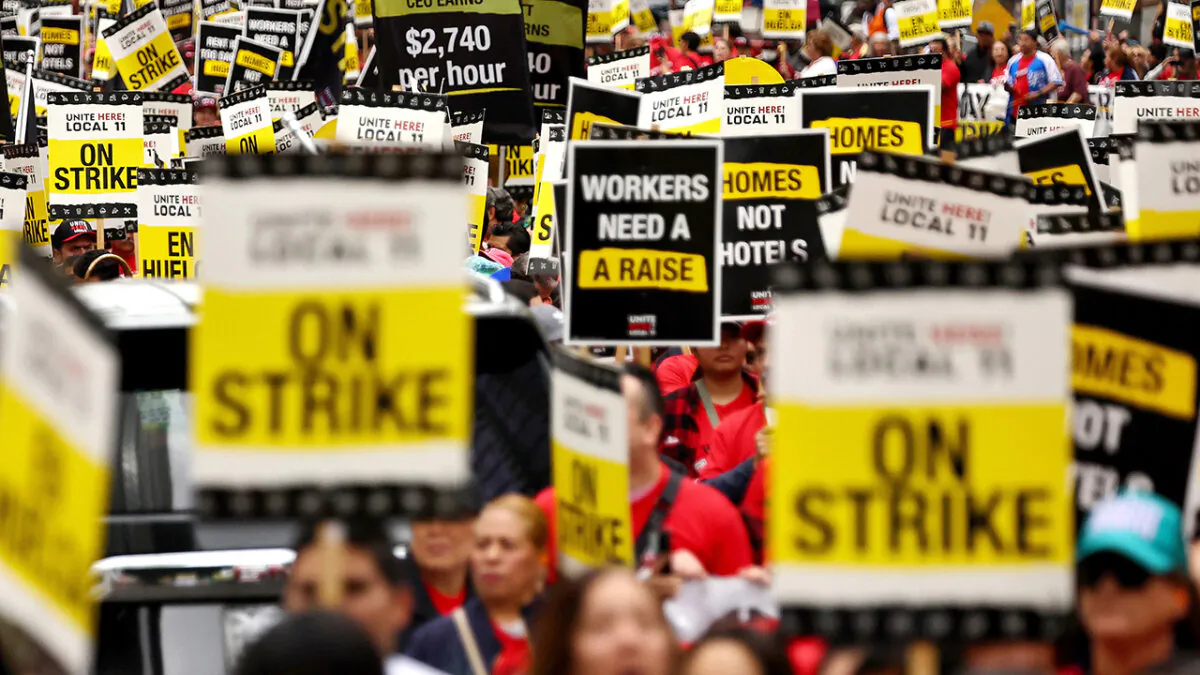 Hotel workers with Unite Here Local 11 march through downtown L.A. calling for a "fair contract" from numerous major hotels in the region in Los Angeles on Oct. 25, 2023. (Mario Tama/Getty Images)
