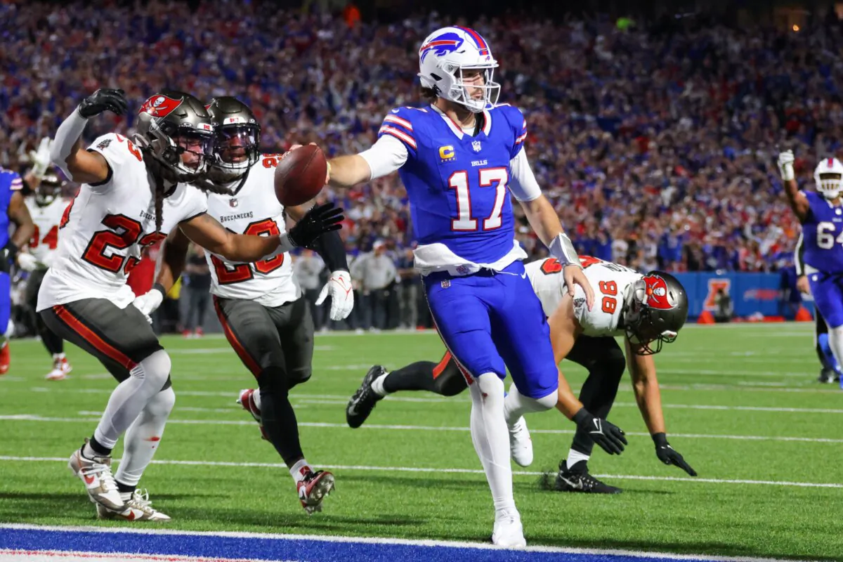 Josh Allen (17) of the Buffalo Bills carries the ball for a touchdown against the Tampa Bay Buccaneers during the second quarter of the game in Orchard Park, N.Y., on Oct. 26, 2023 (Timothy T Ludwig/Getty Images)