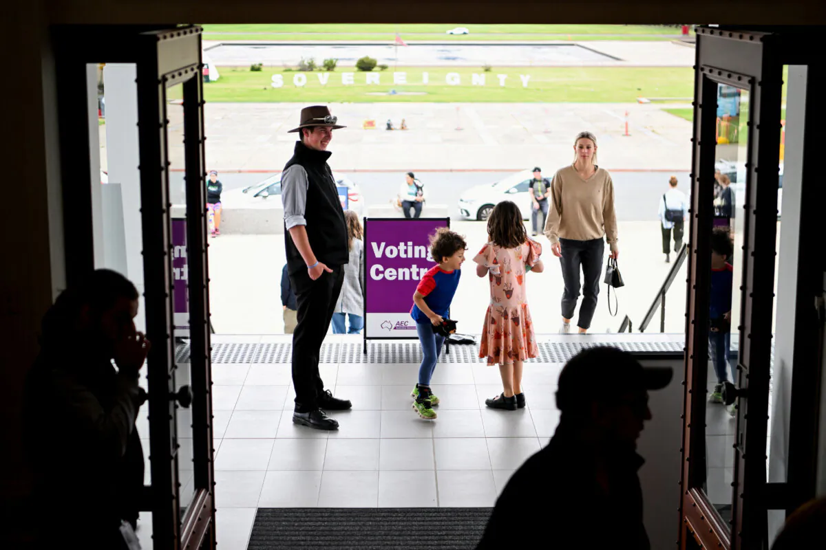 Voters arrive to cast their ballot at the Old Australian Parliament House, during The Voice referendum in Canberra, Australia, October 14, 2023. (Reuters/Tracey Nearmy)