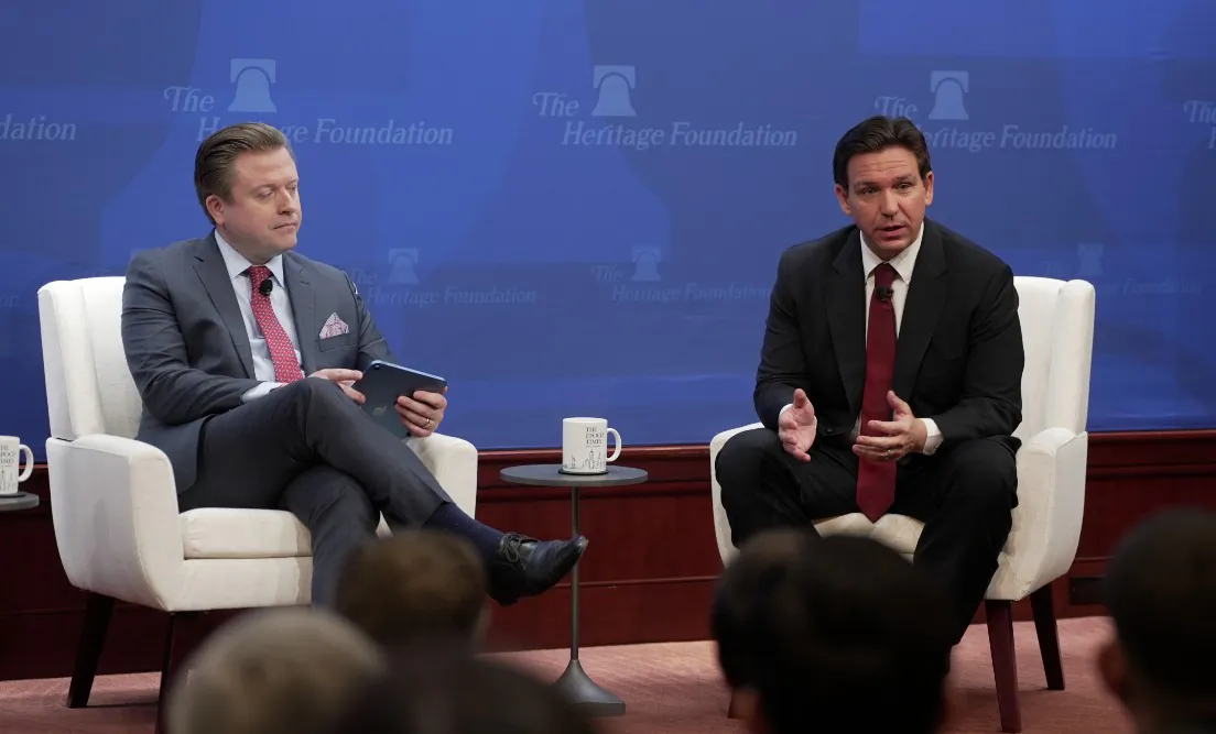 Florida Gov. Ron DeSantis (R) during a Q&A with Epoch Times senior editor Jan Jekielek (L) and Heritage Foundation President Kevin Roberts at the Heritage Foundation in Washington on Oct. 27, 2022. (Erin Granzow)