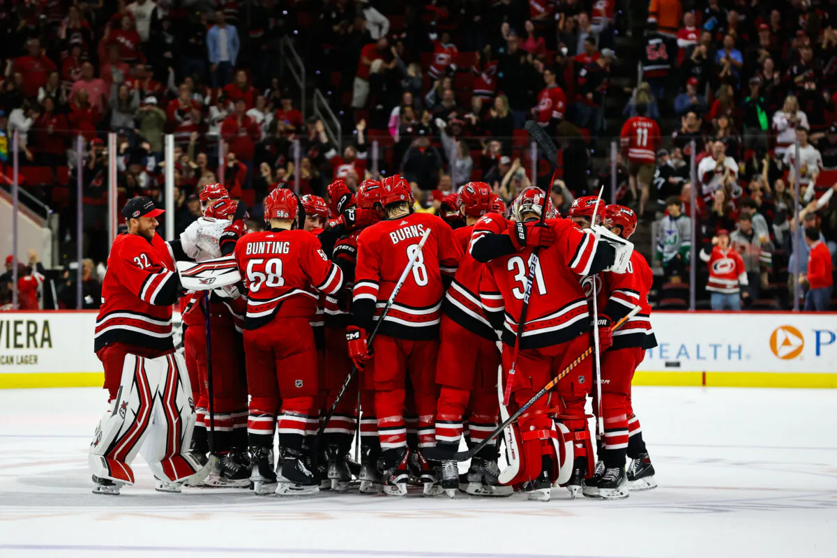 Carolina Hurricanes celebrate their win during the over time of the game against the Seattle Kraken at PNC Arena in Raleigh, N.C., on Oct. 26, 2023. (Jaylynn Nash/Getty Images)