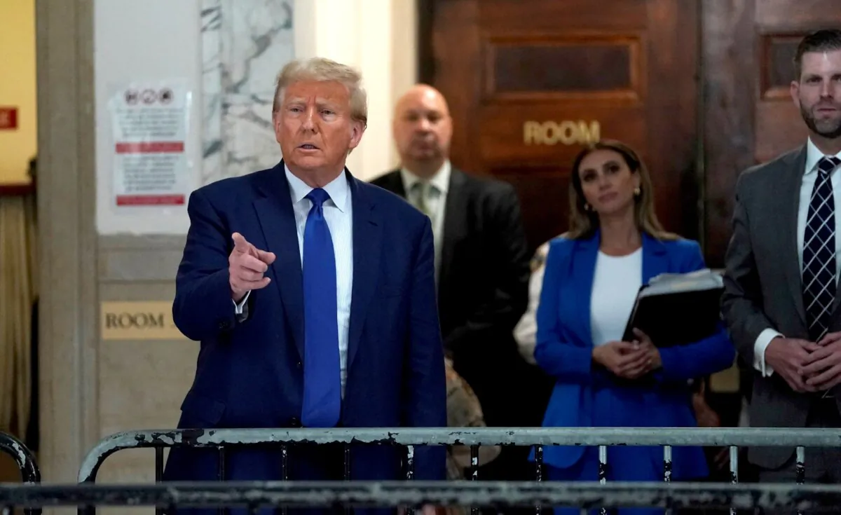 Former President Donald Trump speaks to the press during a break in his civil fraud trial at New York State Supreme Court in New York City on Oct. 25, 2023. (Timothy A. Clary/AFP via Getty Images)