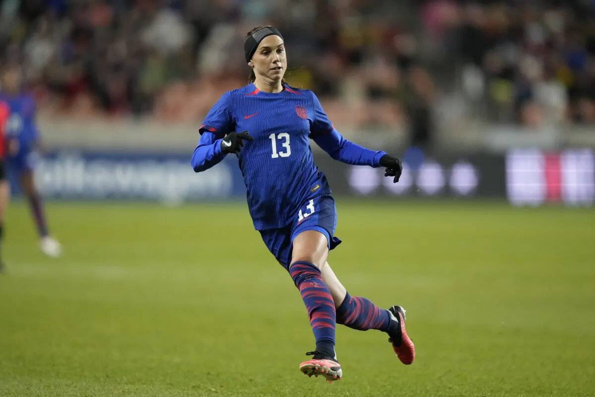 U.S. forward Alex Morgan (13) runs upfield during the first half of the team's international friendly soccer match against Colombia in Sandy, Utah, on Oct. 26, 2023. (Rick Bowmer/AP Photo)