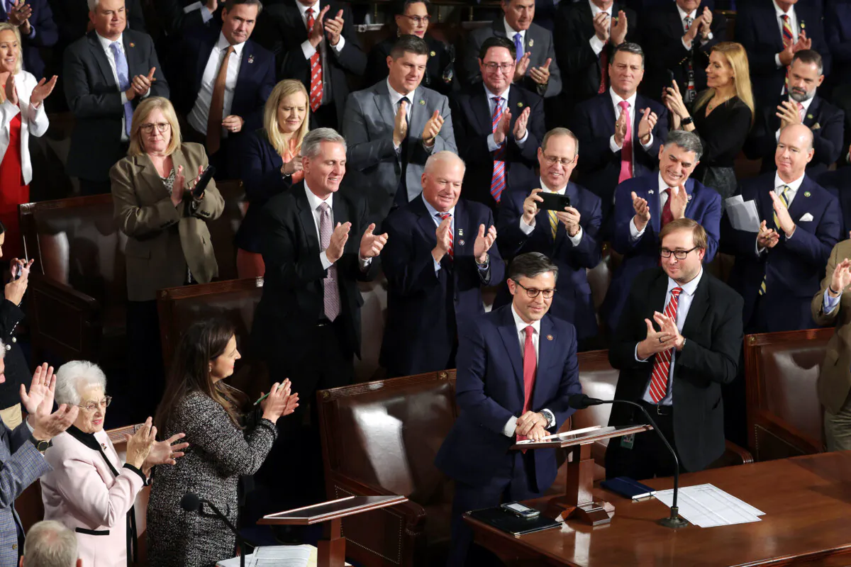 House Republicans applaud as Rep. Mike Johnson (R-La.) (C) is elected the new Speaker of the House, at the U.S. Capitol, in Washington, on Oct. 25, 2023. (Alex Wong/Getty Images)