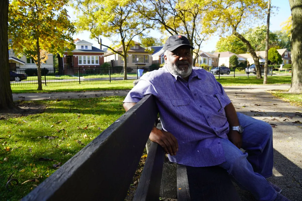 Thomas Simmons sits in Amundsen Park on Oct. 24, 2023. He's one of many deep-rooted locals who have objected to city plans to use it as a shelter for migrants. (Nathan Worcester/Epoch Times)