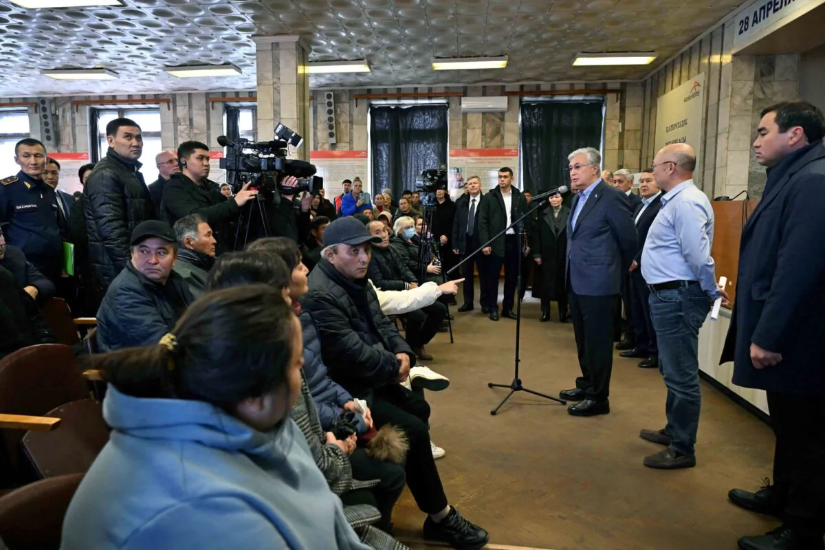 Kazakh President Kassym-Jomart Tokayev meets with relatives of miners who died in a fire at the Kostenko coal mine operated by ArcelorMittal Temirtau in Karaganda Region, Kazakhstan, on Oct. 28, 2023. (Press service of the President of Kazakhstan/Handout via Reuters)