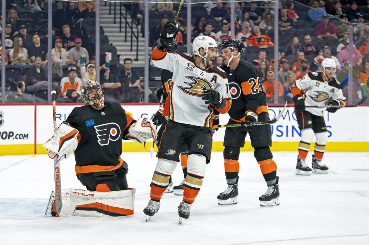 Anaheim Ducks' Adam Henrique, center, reacts to the goal by Frank Vatrano past Philadelphia Flyers' Samuel Ersson (L) during the first period of an NHL hockey game in Philadelphia on Oct. 28, 2023. (AP Photo/Chris Szagola)