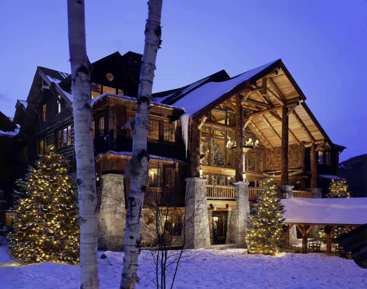 Whiteface Lodge at dusk. The resort is nestled within the woods surrounding Lake Placid, N.Y. (Courtesy of Whiteface Lodge)