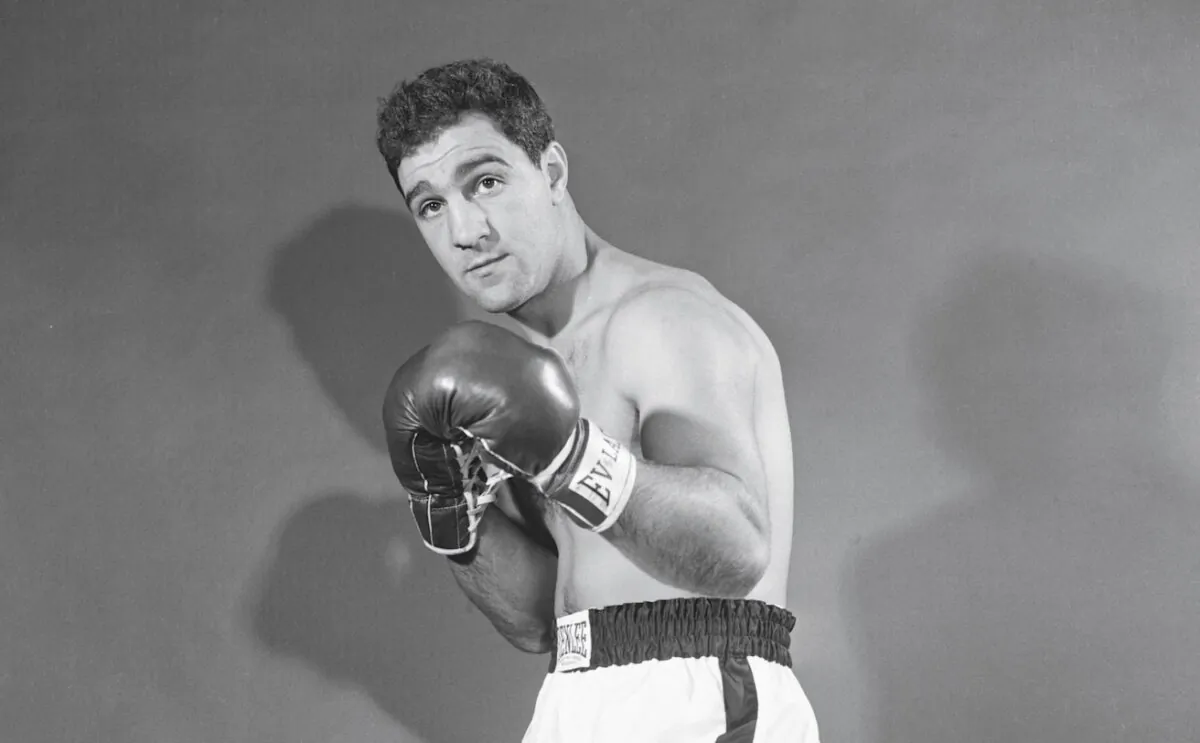 Rocky Marciano in his fighting pose, photographed by Herb Scharfman on November 9, 1951. (Public Domain)