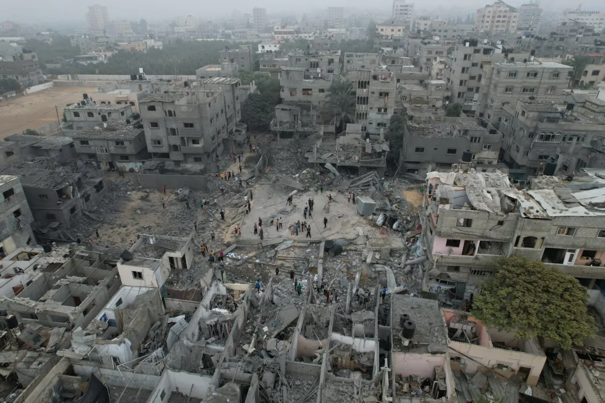 The remains of a mosque and houses destroyed by Israeli strikes in the central Gaza Strip on Oct. 29, 2023. (Mohammed Fayq Abu Mostafa/Reuters)