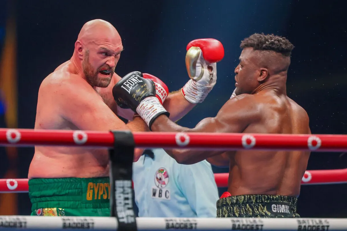 Britain's Tyson Fury (L) fights against Cameroonian-French Francis Ngannou during their heavyweight boxing match in Riyadh early on Oct. 29, 2023. (Fayez Nureldine /AFP via Getty Images)