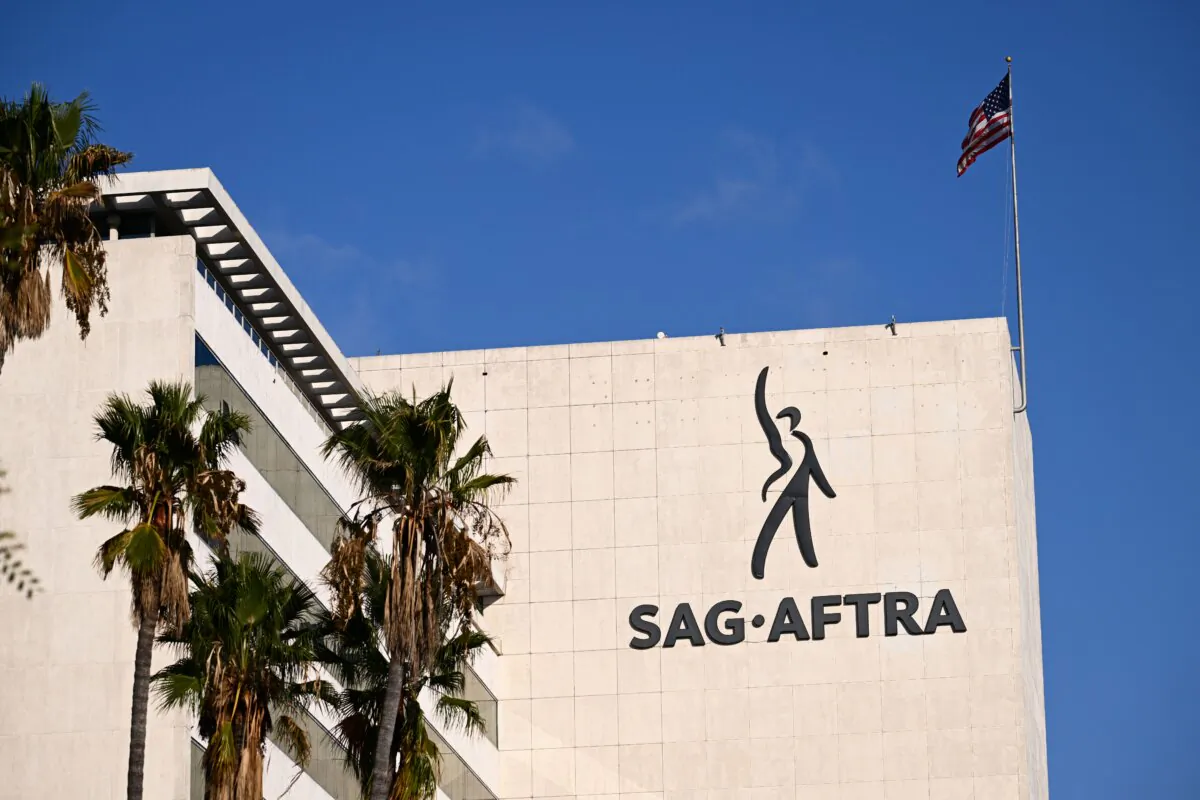 The SAG-AFTRA logo is displayed outside of the National Headquarters on Wilshire Boulevard during the actors' strike in Los Angeles on Oct. 24, 2023. (Patrick T. Fallon/AFP via Getty Images)