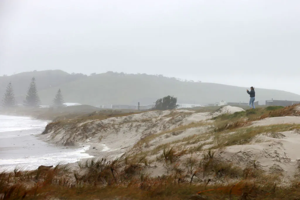 High tide brings large waves and erosion of sand dunes at Omaha Beach in Auckland, New Zealand, on Oct. 30, 2023. (Fiona Goodall/Getty Images)