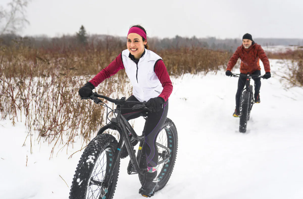 Fat-tire bicycling is one way to enjoy the snow for non-skiers. (Photo courtesy of Lopolo/Dreamstime.com)