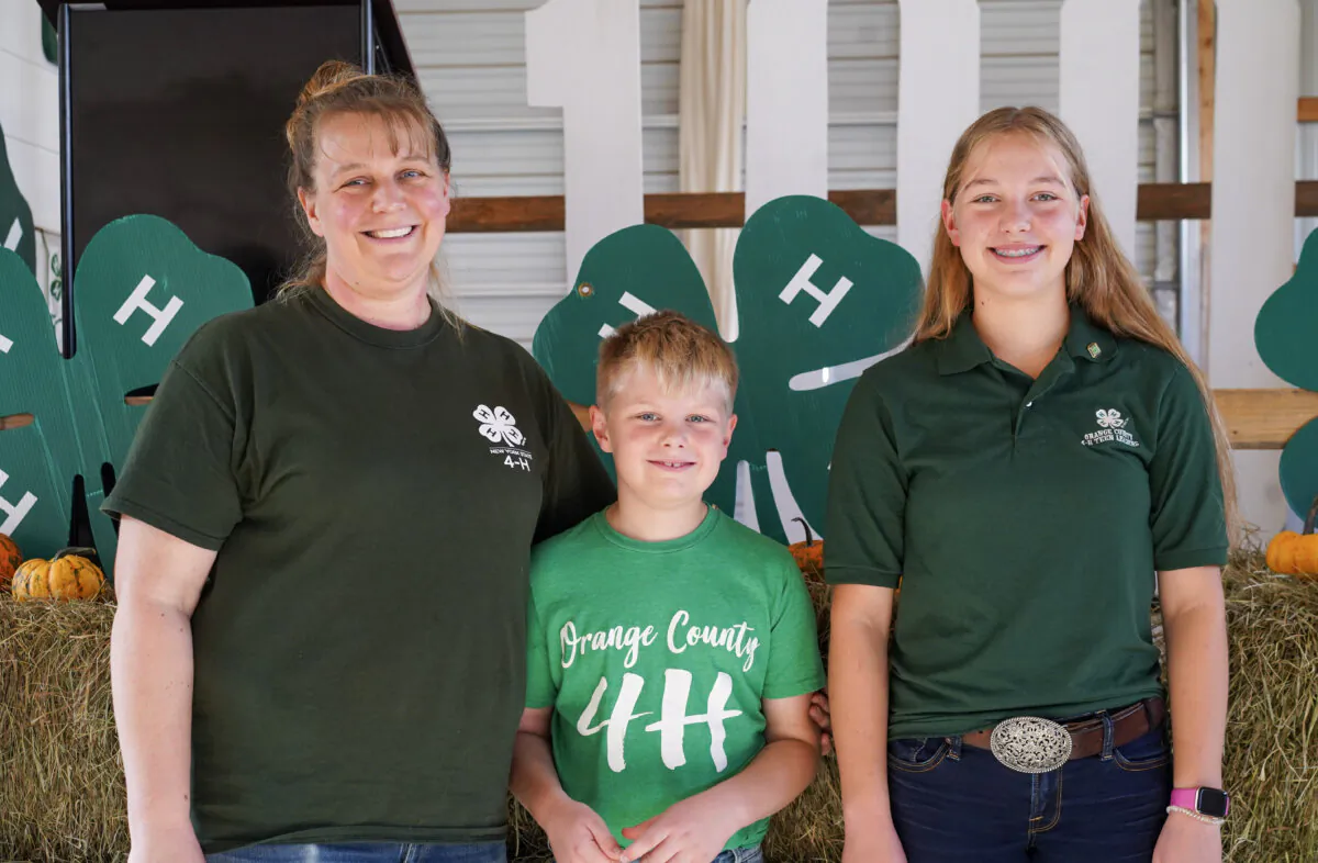 Megan Wieboldt (L), Silas Wieboldt (C), and Hannah Wieboldt at the Orange County 4-H Achievement Celebration Ceremony in Otisville, N.Y., on Oct. 28, 2023. (Cara Ding/The Epoch Times)