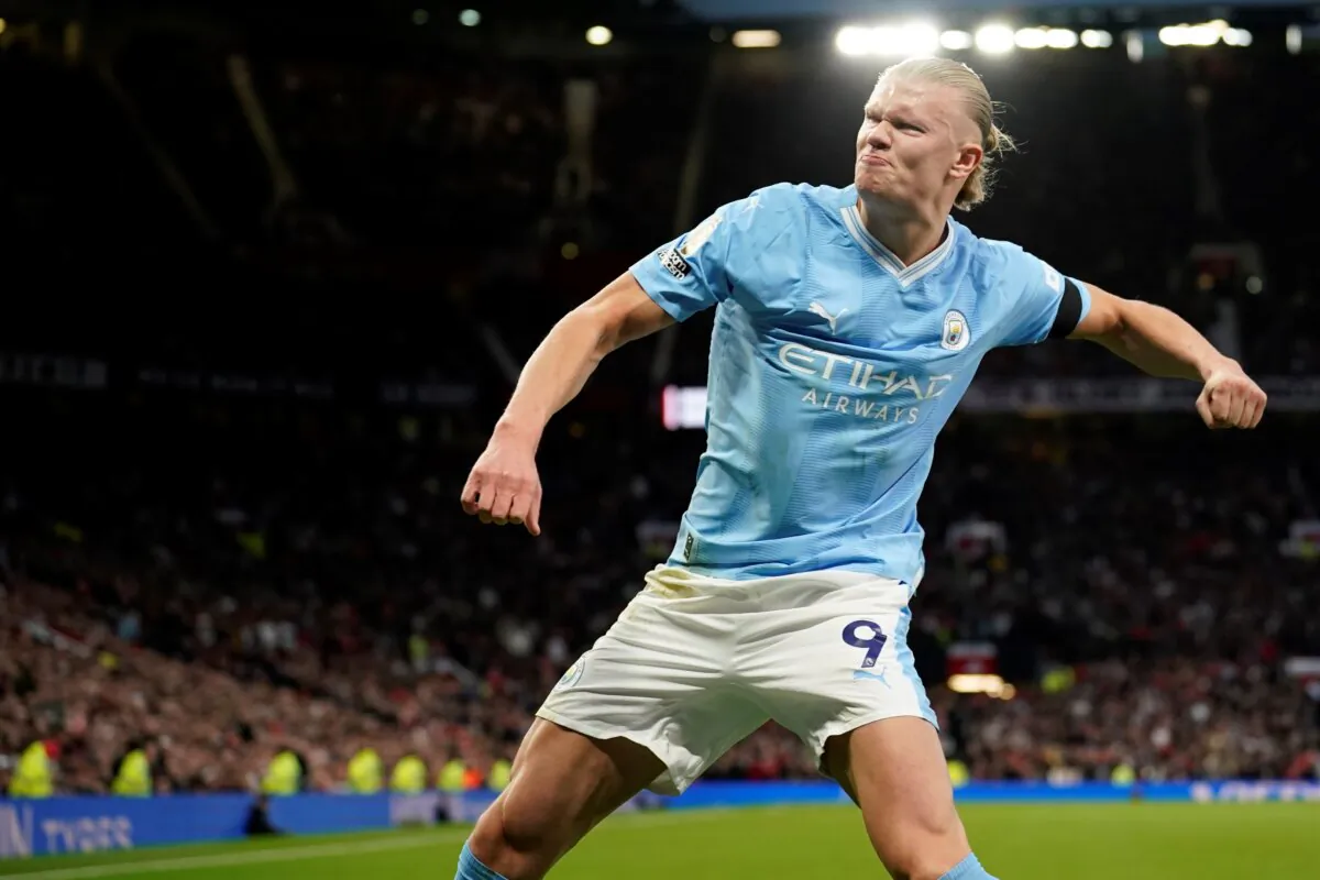 Manchester City's Erling Haaland celebrates after scoring his side's opening goal from a penalty kick during the English Premier League soccer match between Manchester United and Manchester City at Old Trafford stadium in Manchester, England, on Oct. 29, 2023. (Dave Thompson/AP Photo)