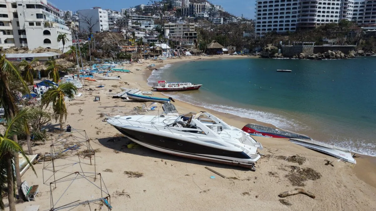 Damaged boats are seen at the Caleta beach in the aftermath of Hurricane Otis in Acapulco, Mexico, on Oct. 29, 2023. (Quetzalli Nicte-Ha/Reuters)