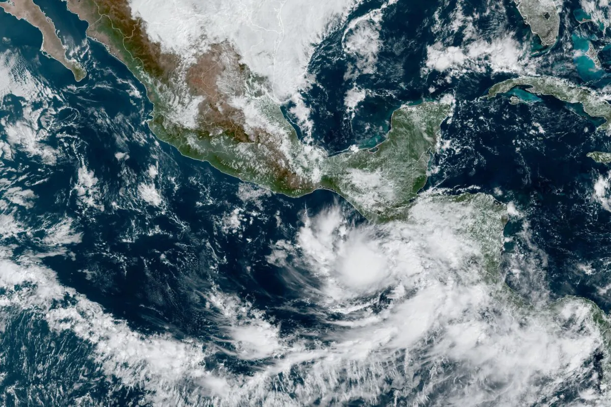 A satellite image shows Tropical Storm Pilar approaching El Salvador on the Pacific coast of Central America on Oct. 30, 2023. (NOAA via AP)