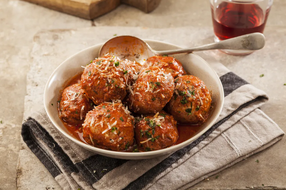 Ground pork is the key to making a decent Italian meatball. (Maria Komar/Shutterstock)
