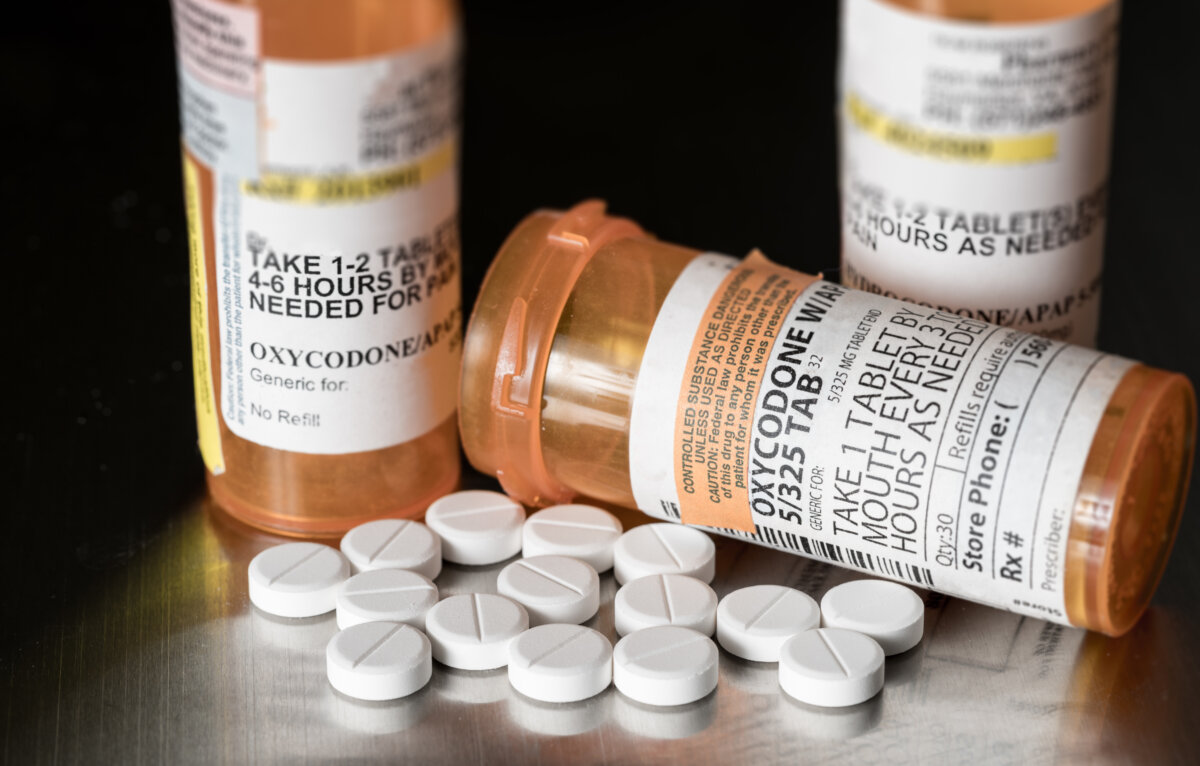Prescription bottles of generic oxycodone tablets.