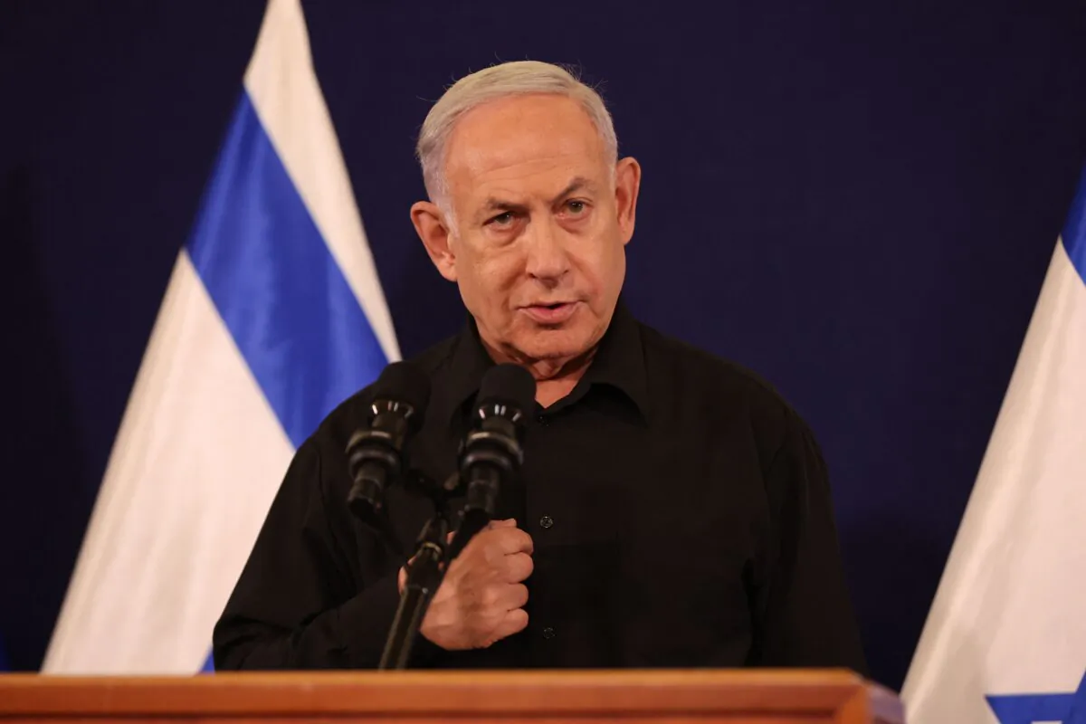 Israeli Prime Minister Benjamin Netanyahu speaks amid ongoing battles between Israel and the terrorist group Hamas, during a press conference in the Kirya military base in Tel Aviv, Israel, on Oct. 28, 2023. (Abir Sultan/Pool/AFP via Getty Images)