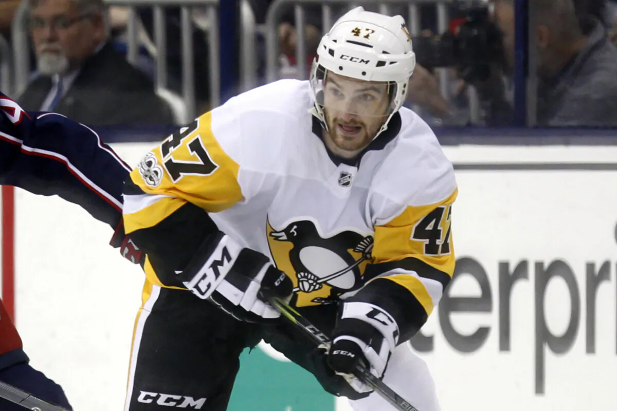 Adam Johnson in action for Pittsburgh Penguins during an NHL hockey game in Columbus, Ohio, on Sept. 22, 2017. (Paul Vernon/AP Photo)
