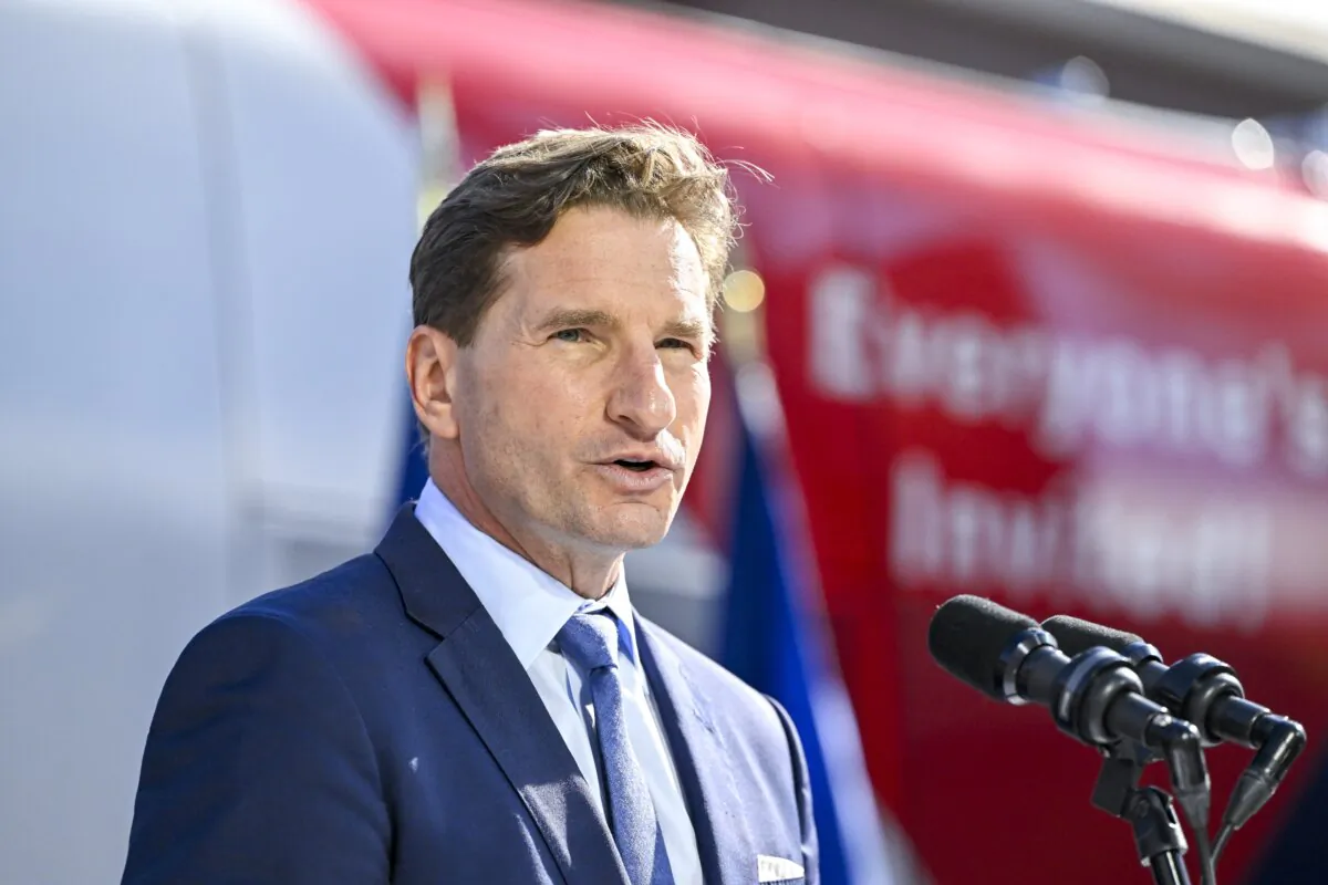 Rep. Dean Phillips (D-Minn.) holds a rally outside of the New Hampshire Statehouse after handing over his declaration of candidacy form for president to the New Hampshire Secretary of State David Scanlan, in Concord, N.H., on Oct. 27, 2023. (Gaelen Morse/Getty Images)