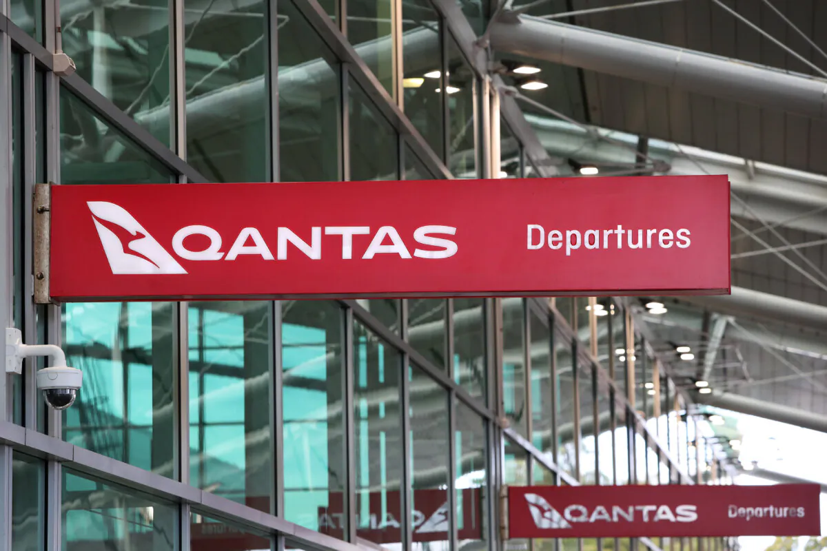 Signage is seen on display at the Qantas domestic terminal at Sydney Airport in Sydney, Australia, on Aug. 25, 2022. (Lisa Maree Williams/Getty Images)