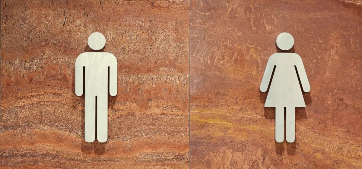 Male and female bathroom signs can be seen at Perth Airport, Australia, on Oct. 31, 2023. (Susan Mortimer/The Epoch Times)